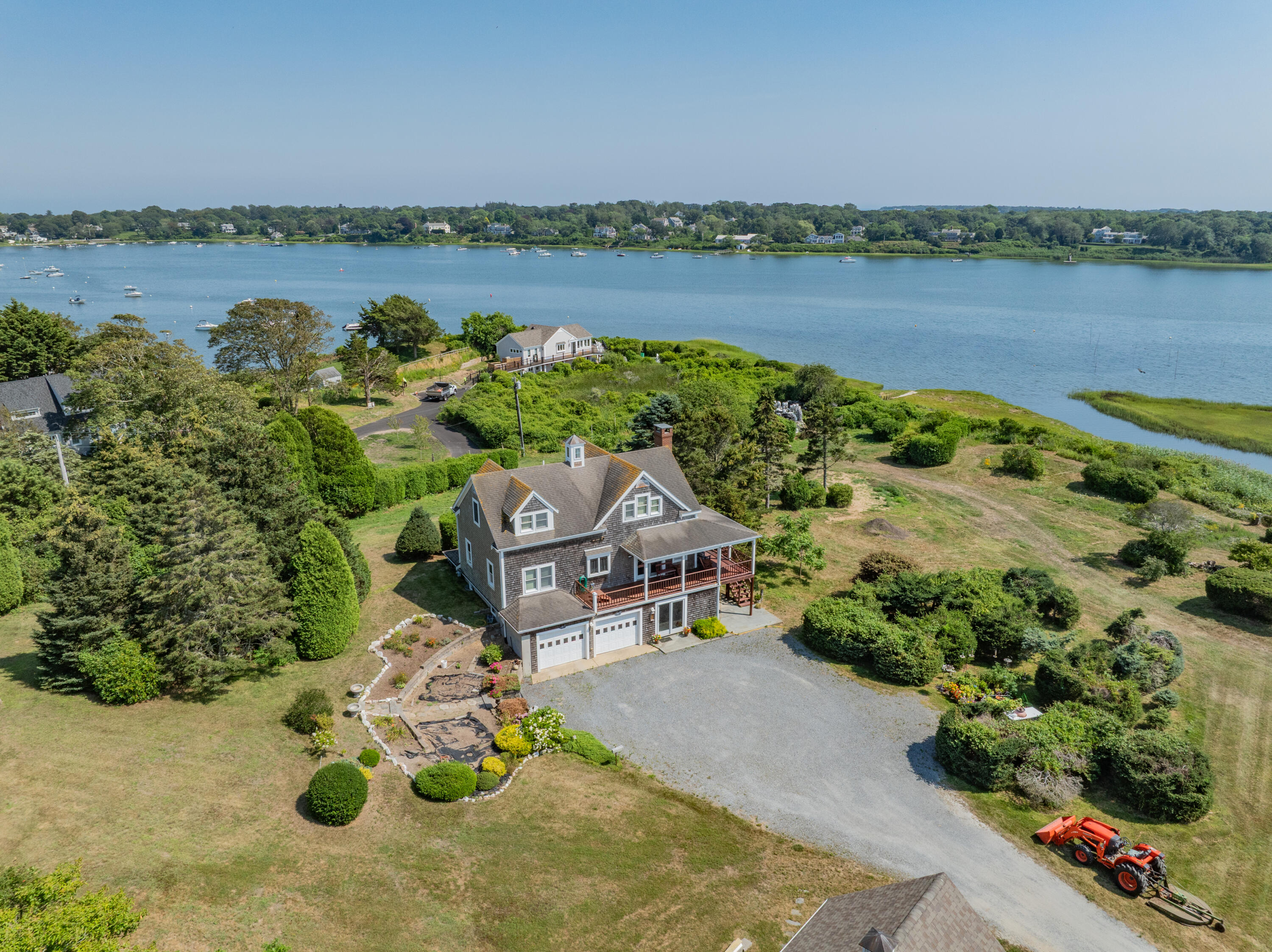 99 Uncle Alberts Drive Chatham, MA 02633 - Photo 23 of 32 an aerial view of a house with garden space and lake view