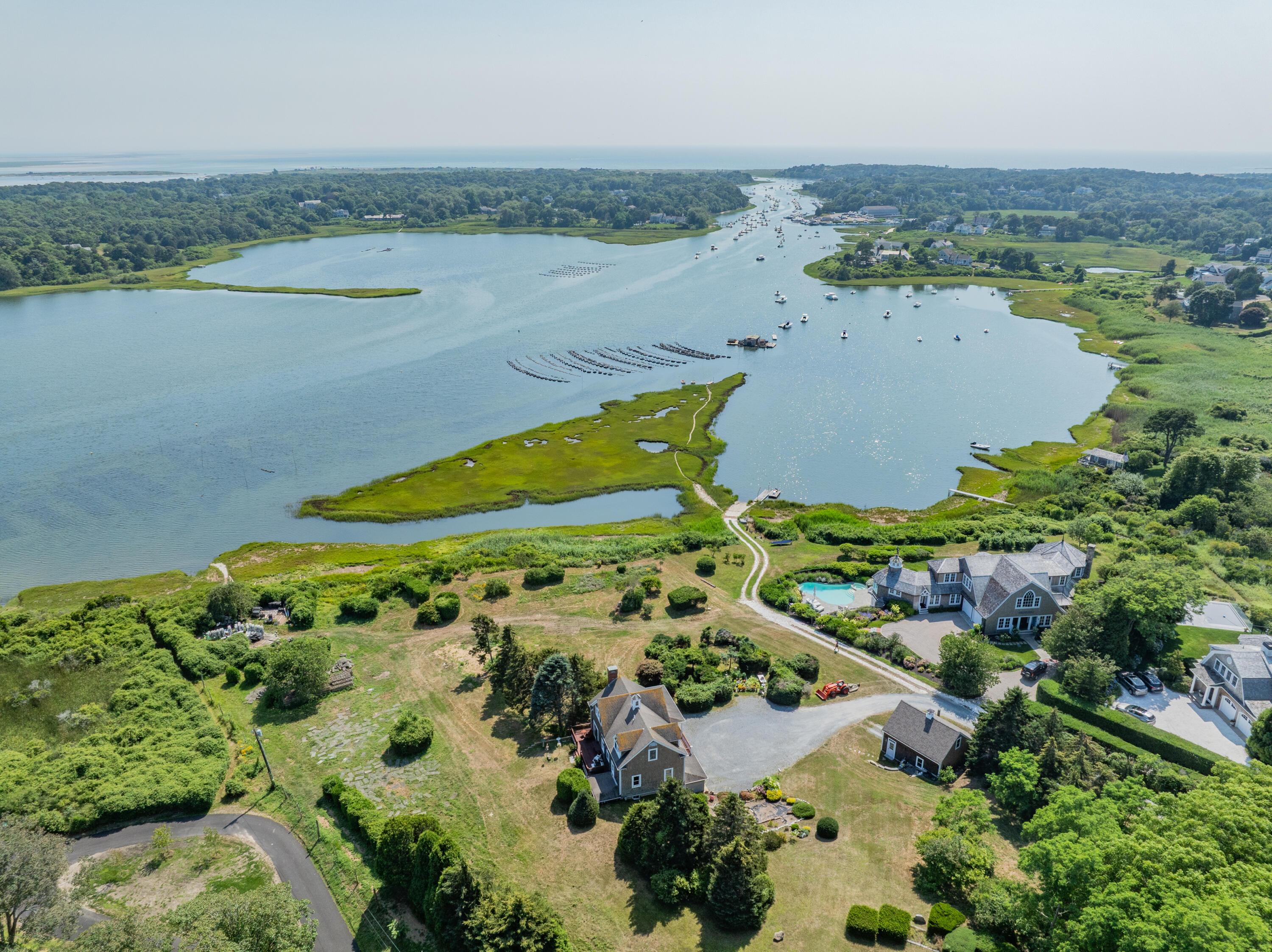 99 Uncle Alberts Drive Chatham, MA 02633 - Photo 27 of 32 an aerial view of ocean with residential house and outdoor space