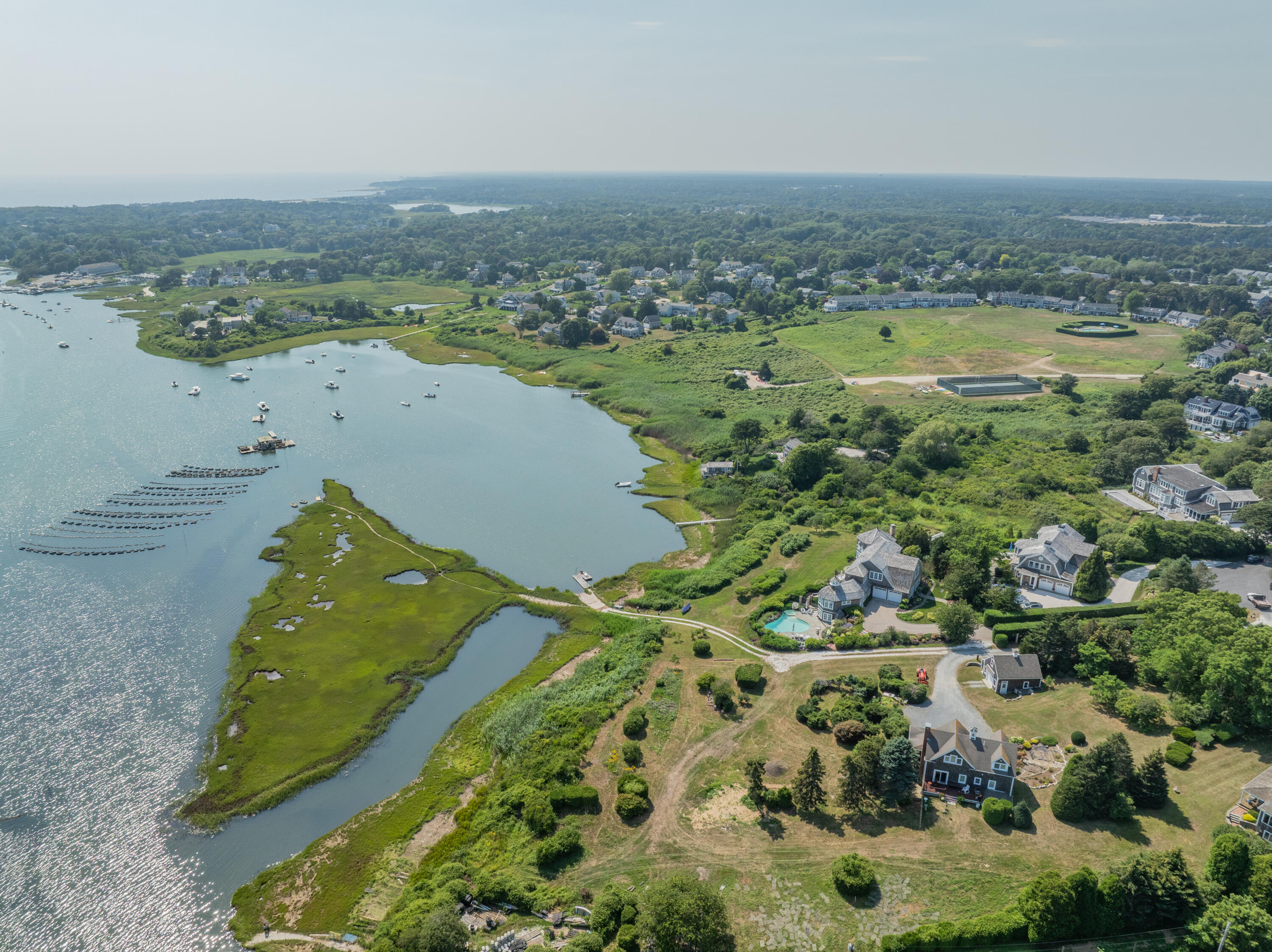 99 Uncle Alberts Drive Chatham, MA 02633 - Photo 3 of 32 a view of an ocean and beach