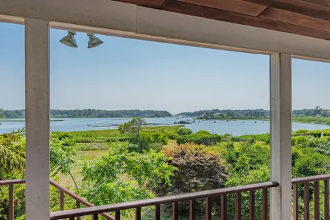 a view of a garden from a balcony