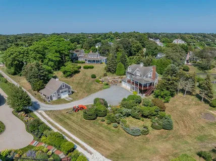 an aerial view of a house with a garden