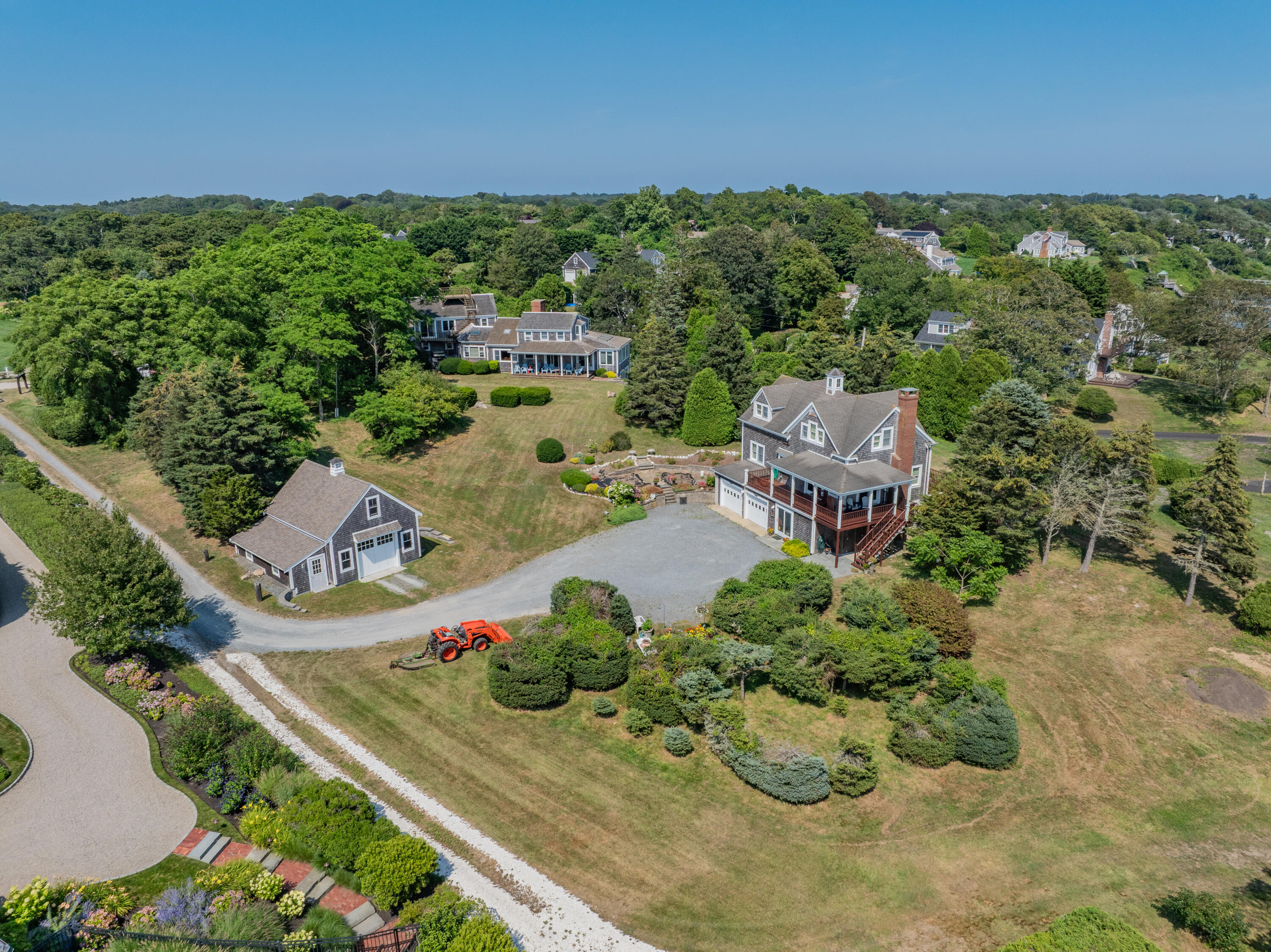 99 Uncle Alberts Drive Chatham, MA 02633 - Photo 5 of 32 an aerial view of a house with a garden