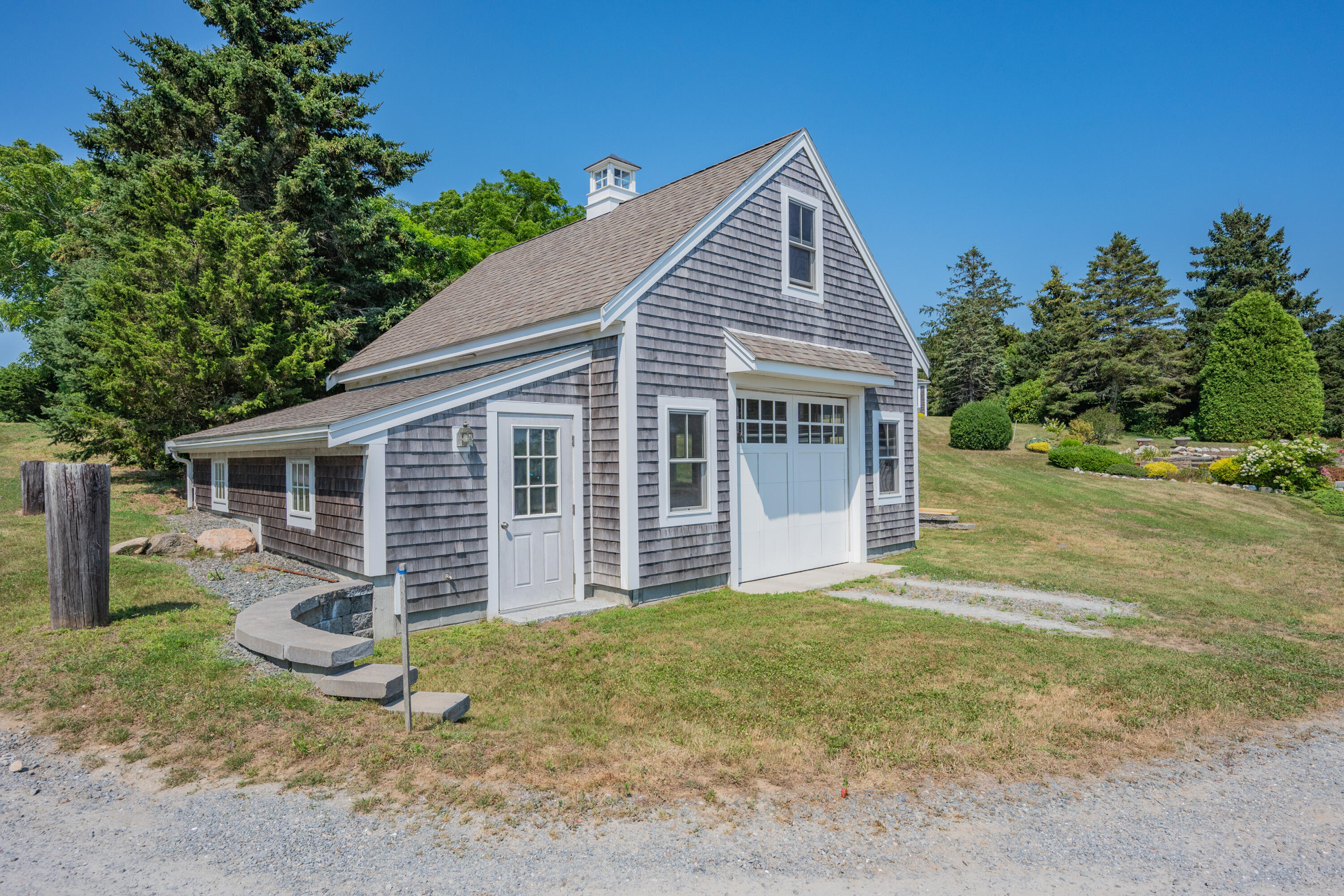 99 Uncle Alberts Drive Chatham, MA 02633 - Photo 7 of 32 a view of a house with a yard