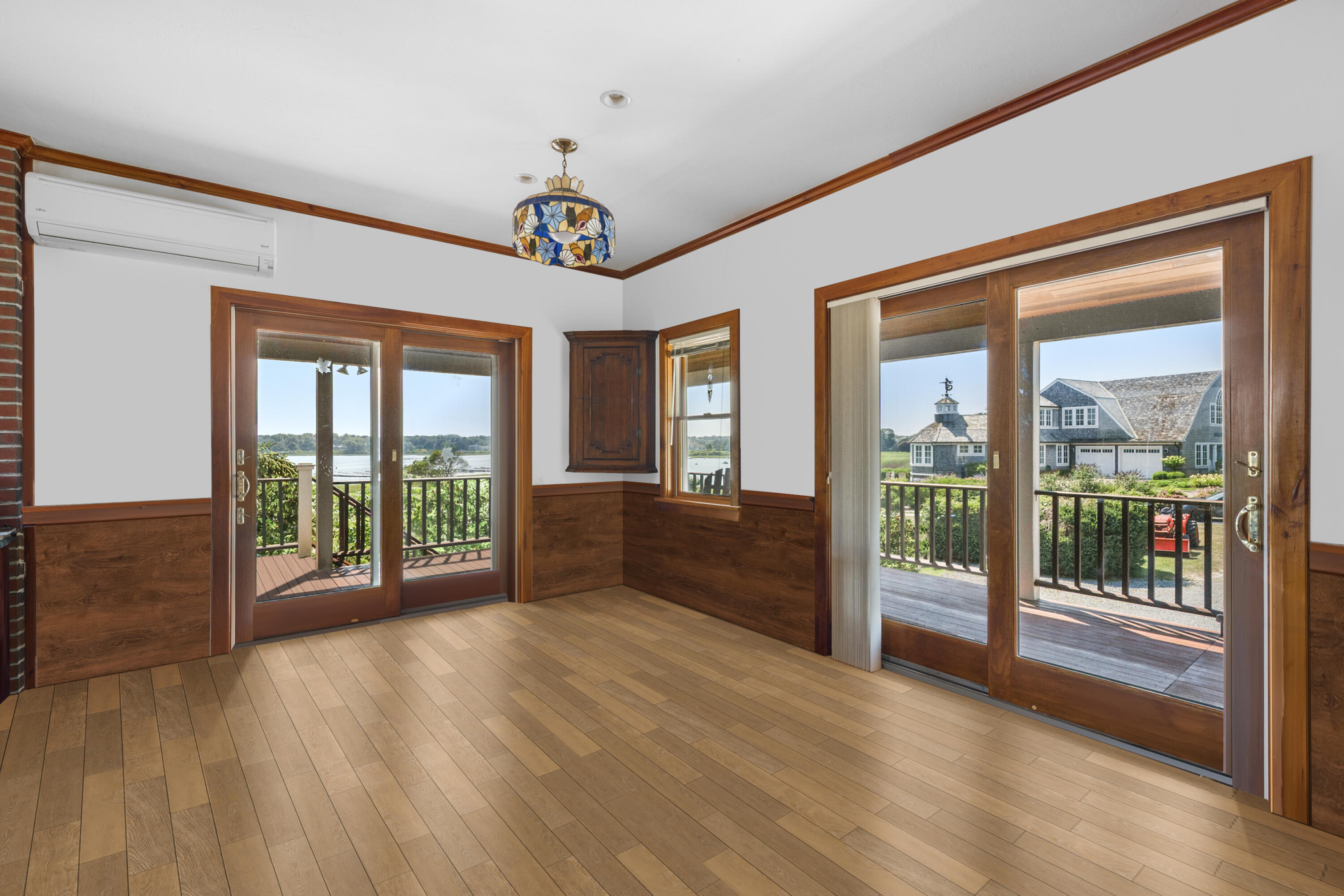 99 Uncle Alberts Drive Chatham, MA 02633 - Photo 10 of 32 a view of an entryway with wooden floor