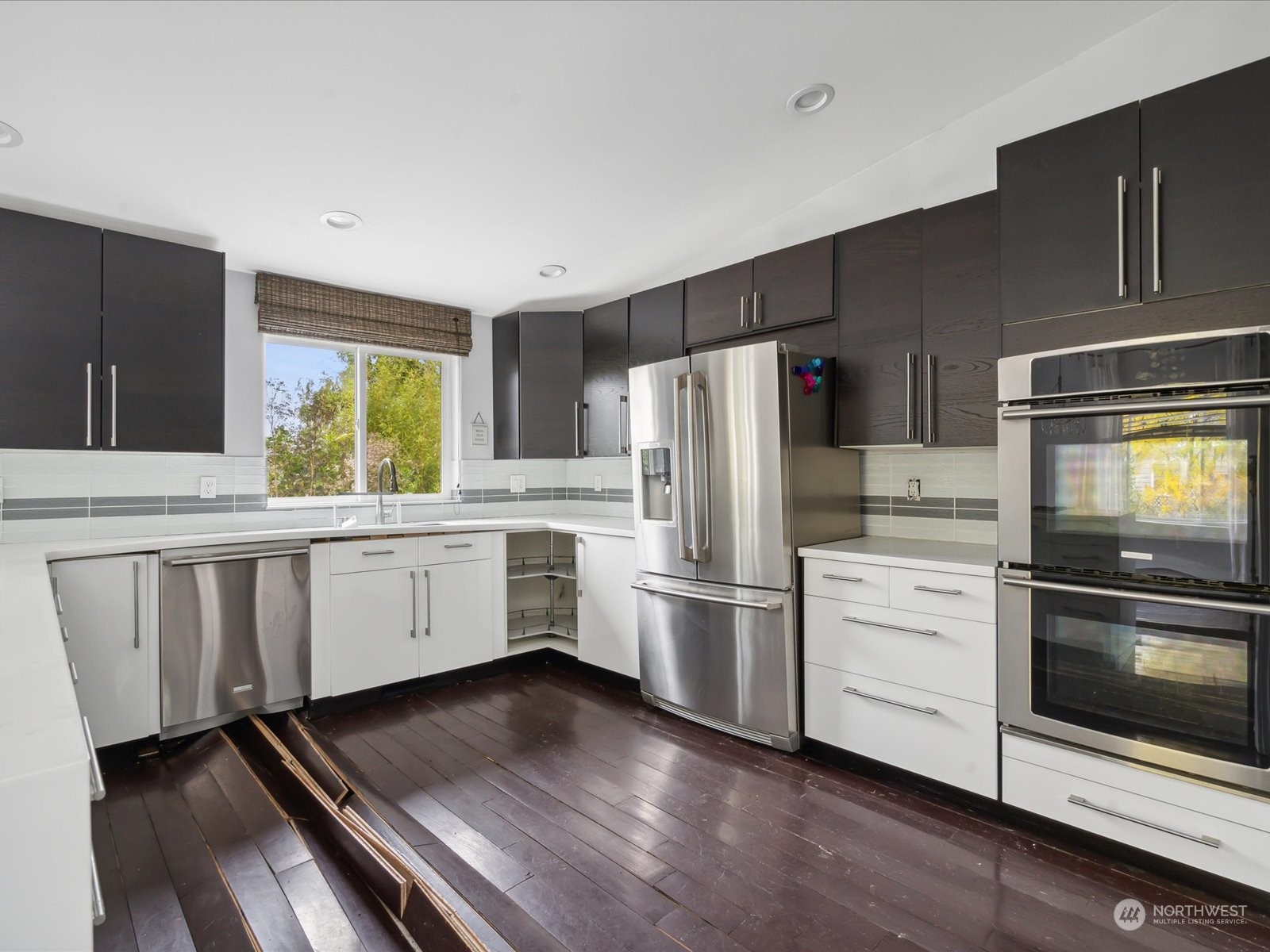 100 Torres Court Sequim, WA 98382 - Photo 12 of 26 a kitchen with stainless steel appliances a refrigerator sink and stove