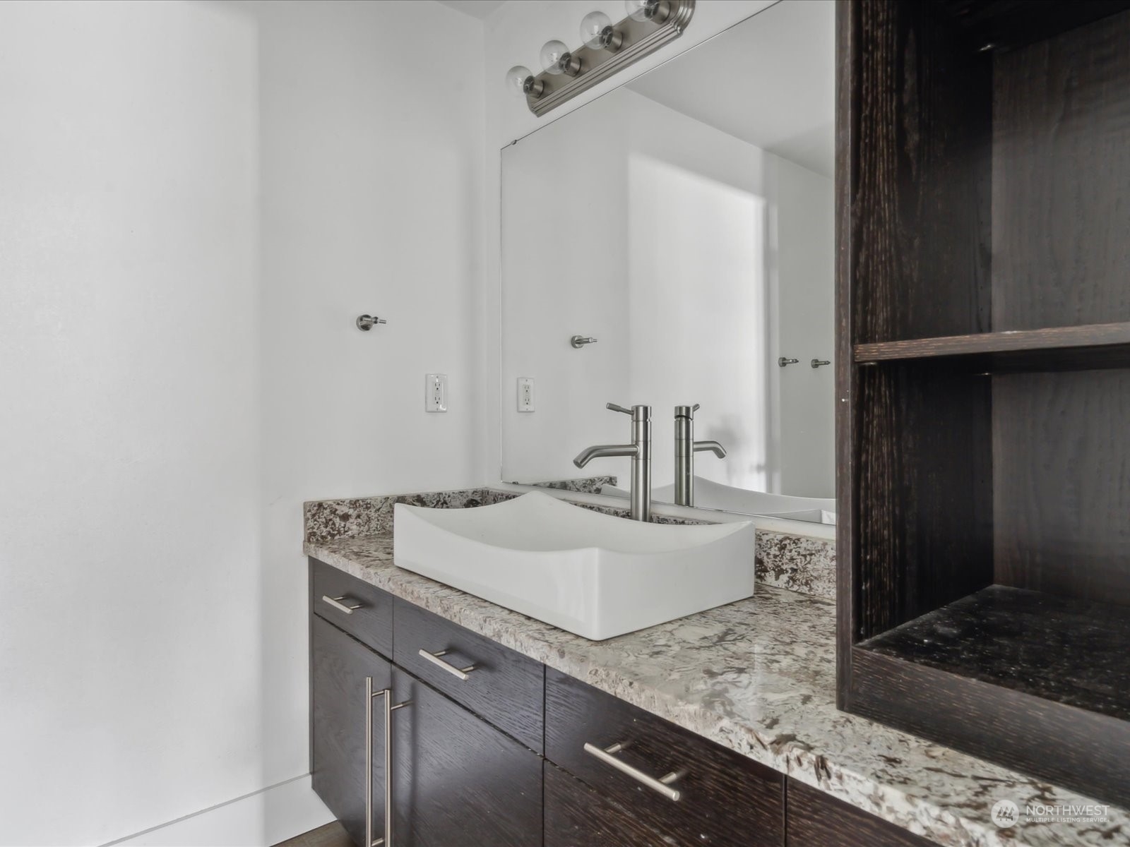 100 Torres Court Sequim, WA 98382 - Photo 17 of 26 a bathroom with a granite countertop sink and a mirror
