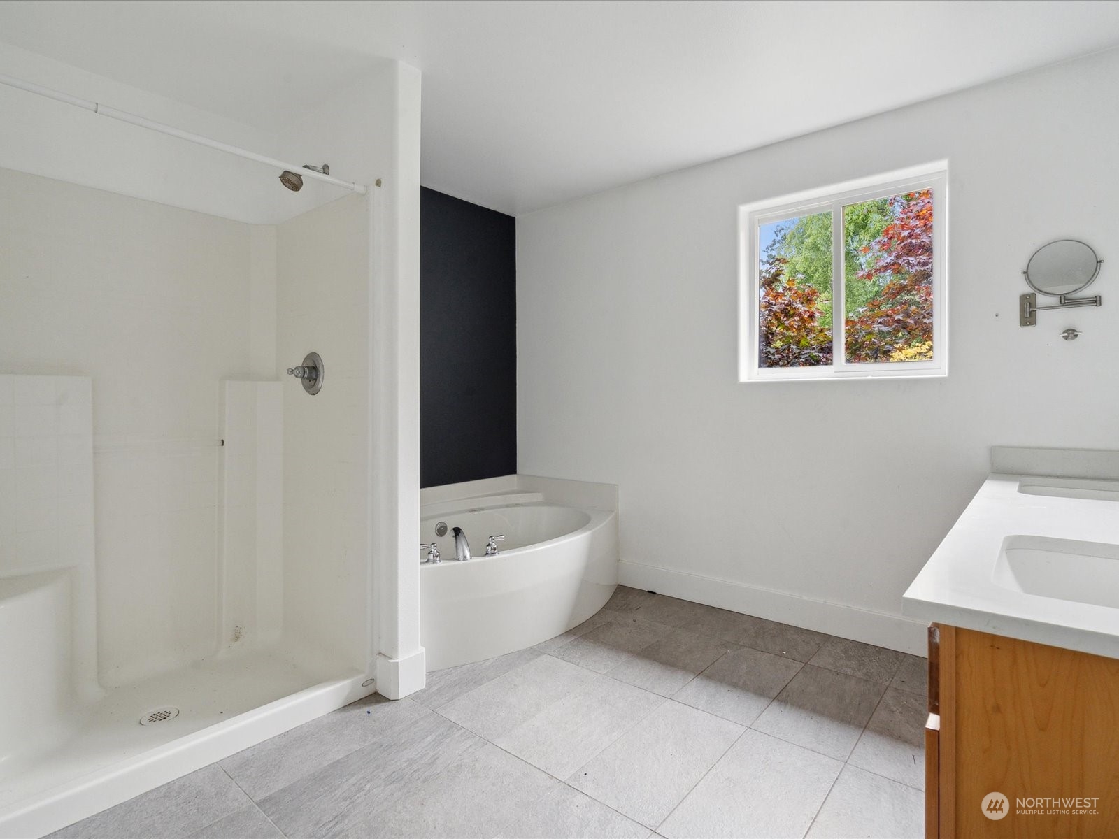 100 Torres Court Sequim, WA 98382 - Photo 22 of 26 a bathroom with a bathtub and a shower