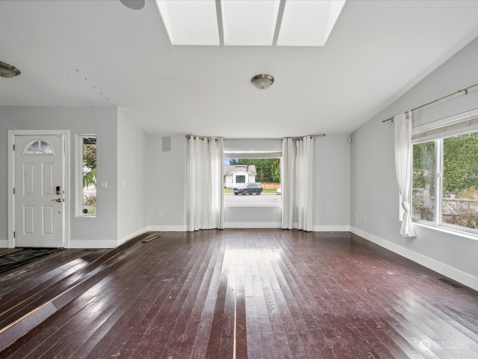 100 Torres Court Sequim, WA 98382 - Photo 4 of 26 a view of a room with wooden floor and window