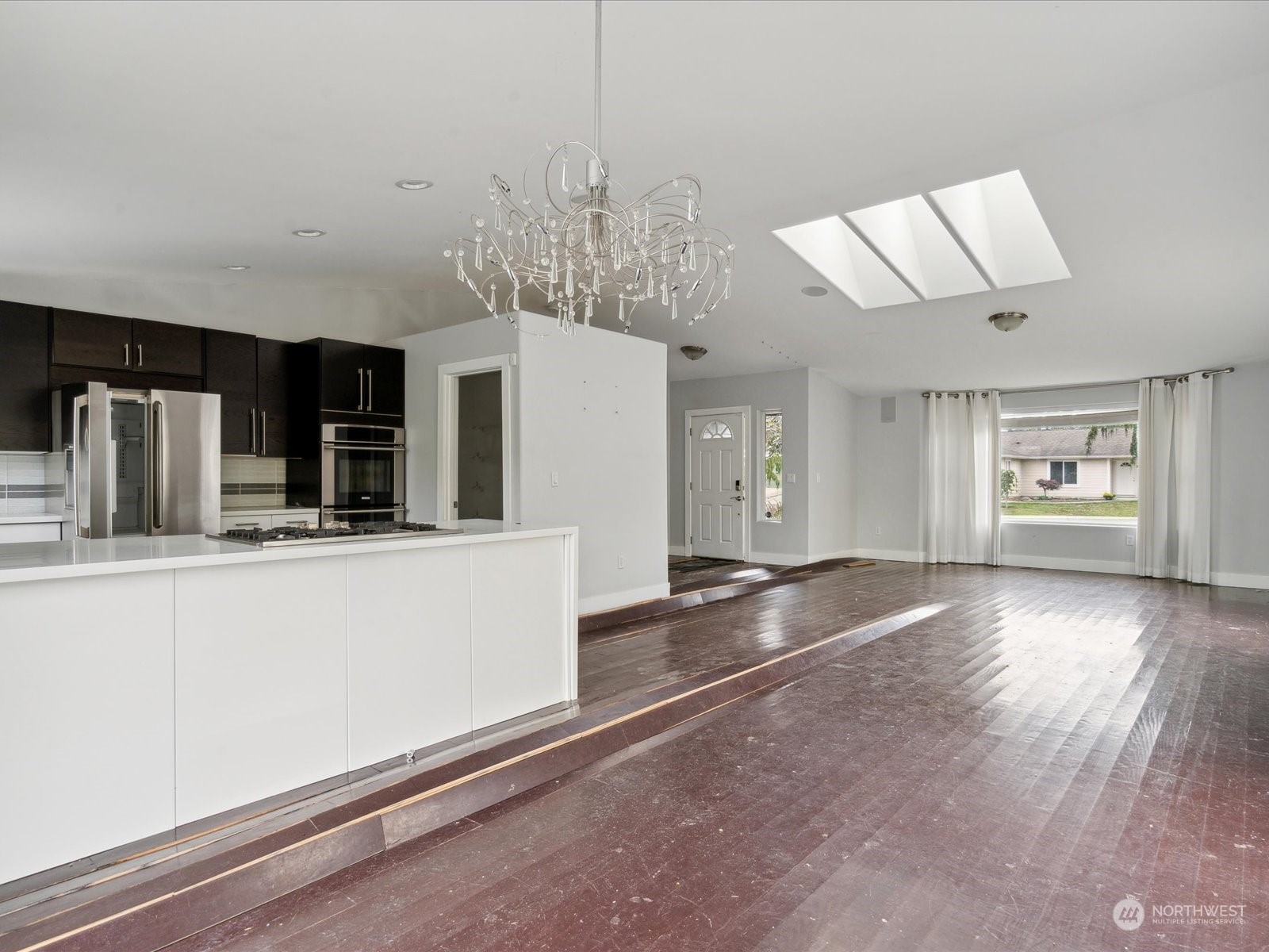 100 Torres Court Sequim, WA 98382 - Photo 7 of 26 a view of kitchen with sink microwave and cabinets