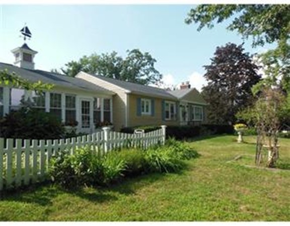 280 Forest Hills Road Springfield, MA 01128 - Photo 3 of 23 a front view of a house with a yard