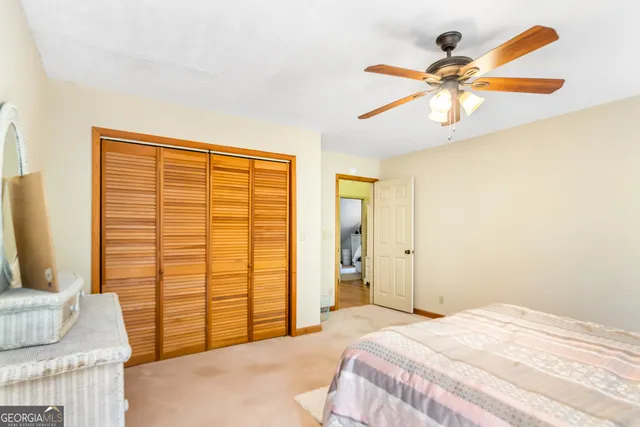 a view of an empty room with a flat screen tv