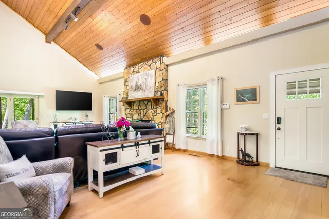 a dining room with a table and chairs