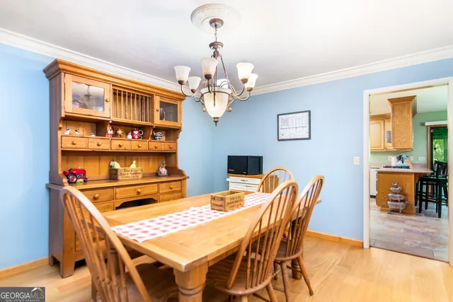 a kitchen with a sink cabinets and window