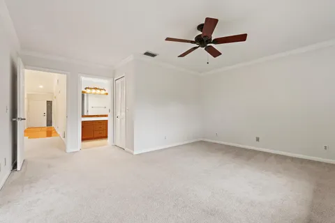 a view of an empty room with a large window