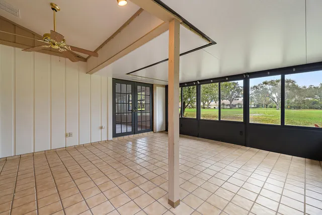 a view of a backyard tables and chairs