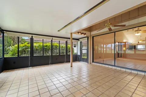 a outdoor space with lots of furniture and couches
