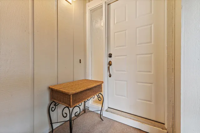 a kitchen with stainless steel appliances a stove microwave and sink