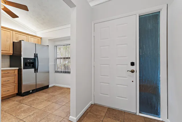 a kitchen with a sink and a microwave