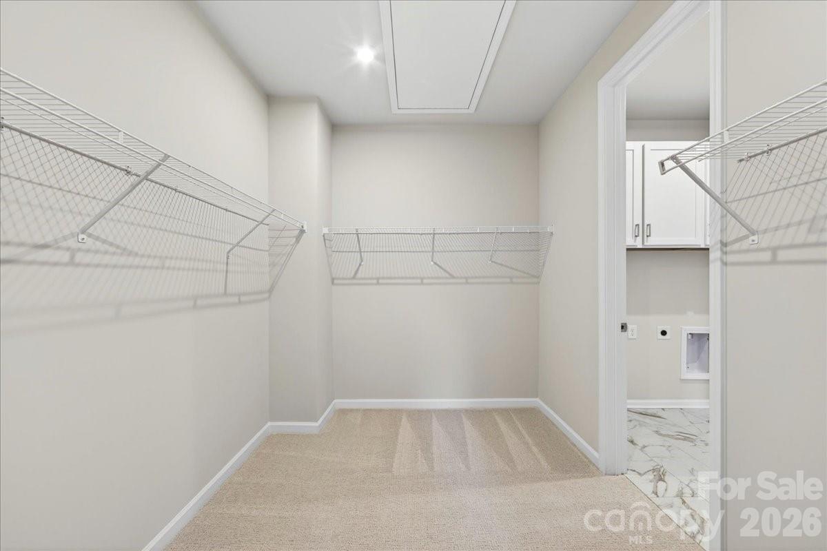 512 Webster Lane Cramerton, NC 28032 - Photo 21 of 28 a view of a room with racks on the wall