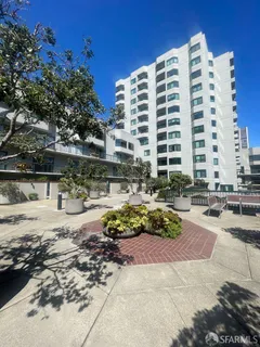 a front view of a building with outdoor area