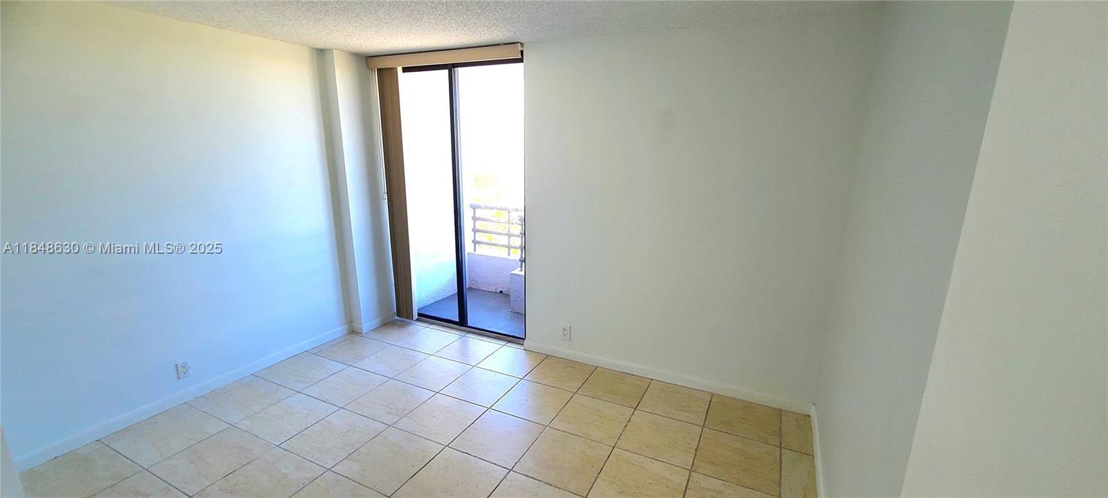 3300 Northeast 191st Street, Unit 1207 Aventura, FL 33180 - Photo 11 of 33 a view of an empty room with window