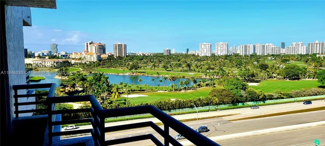 a kitchen with stainless steel appliances granite countertop a refrigerator and a stove