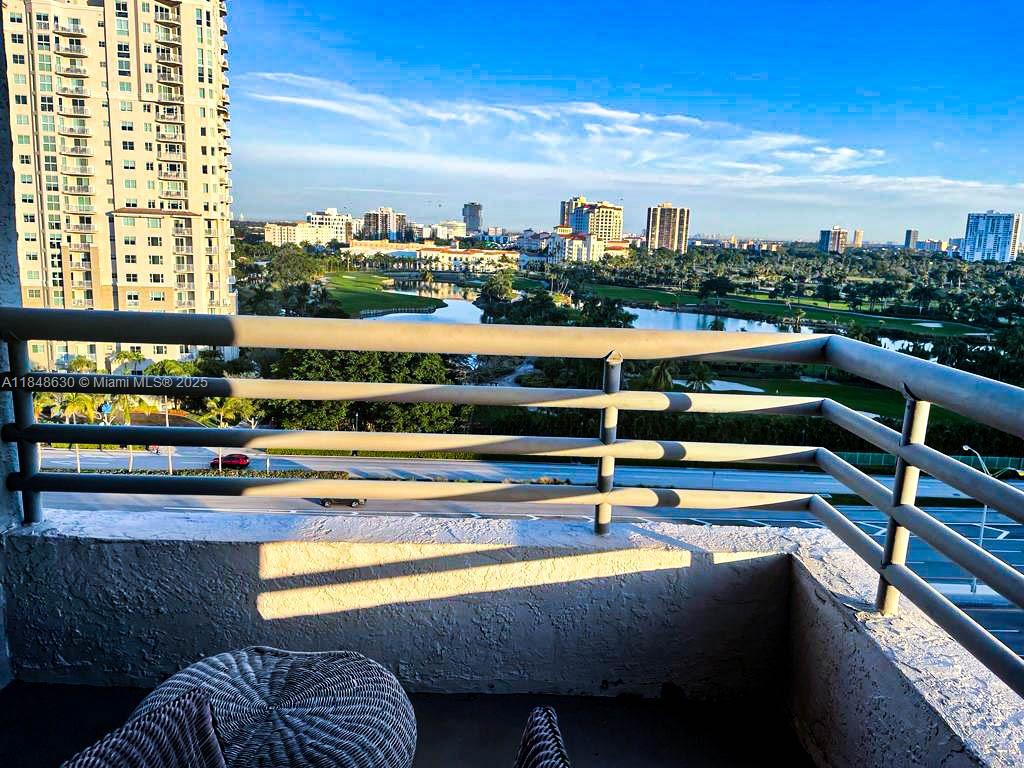 3300 Northeast 191st Street, Unit 1207 Aventura, FL 33180 - Photo 20 of 33 a view of swimming pool with outdoor seating and city view