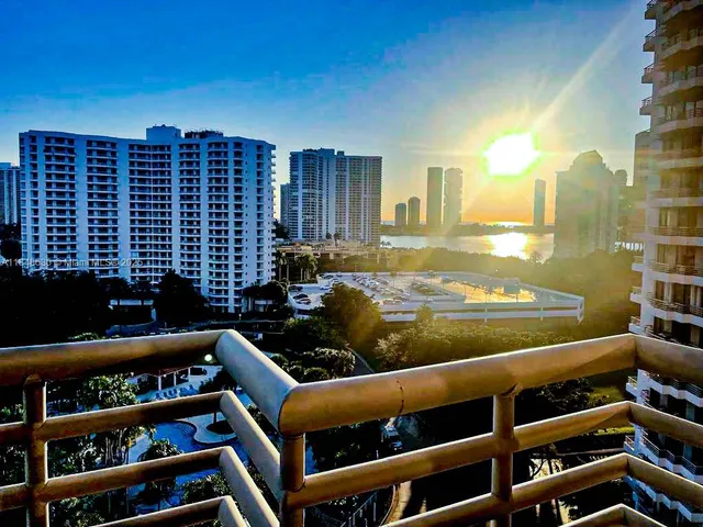 a view of swimming pool from a balcony