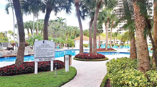 a view of a dinning table and chairs in patio