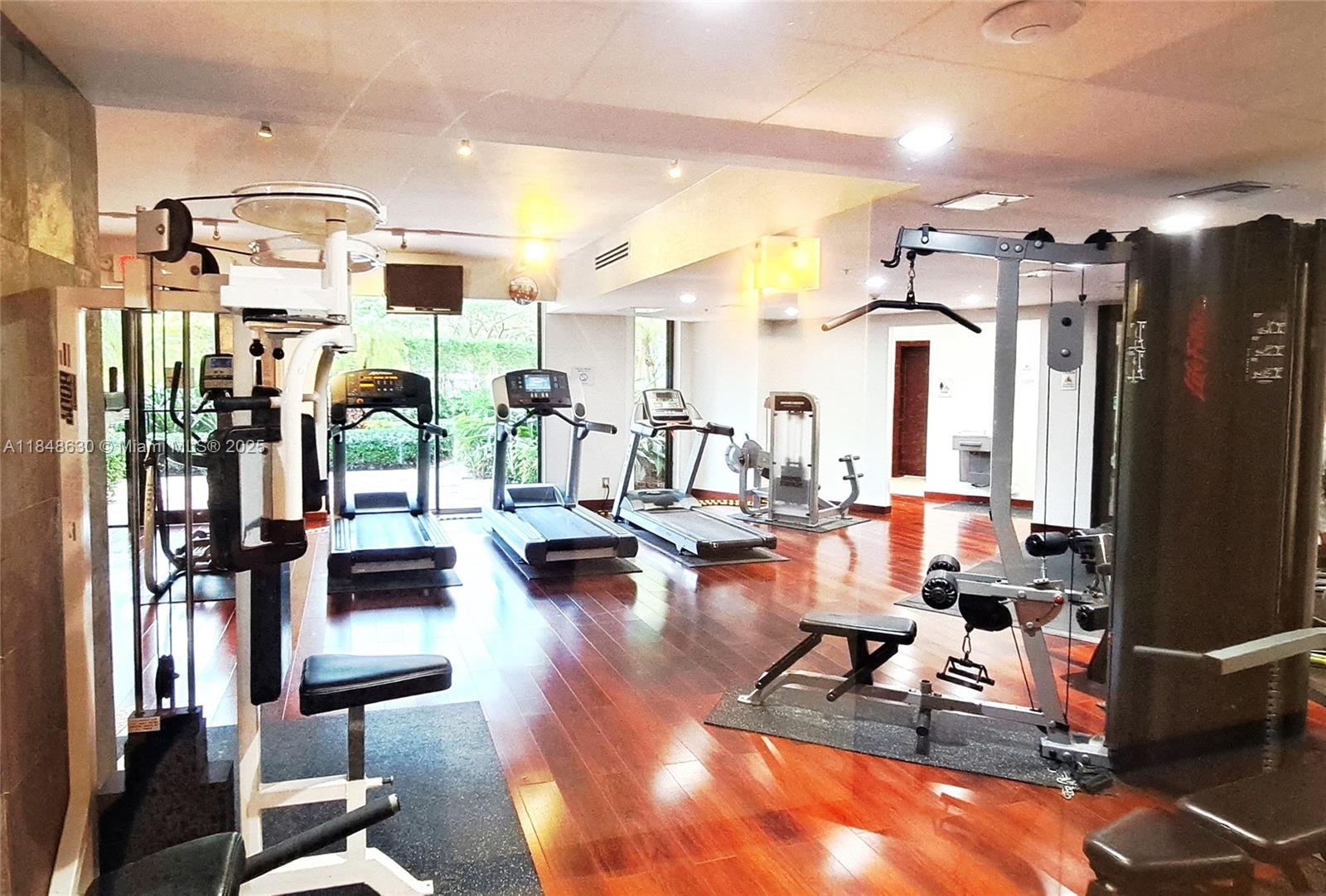 3300 Northeast 191st Street, Unit 1207 Aventura, FL 33180 - Photo 24 of 33 a view of a room with gym equipment