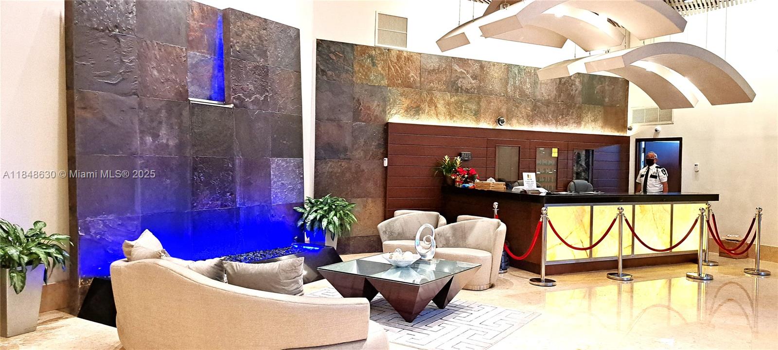 3300 Northeast 191st Street, Unit 1207 Aventura, FL 33180 - Photo 25 of 33 a view of entryway with outdoor seating