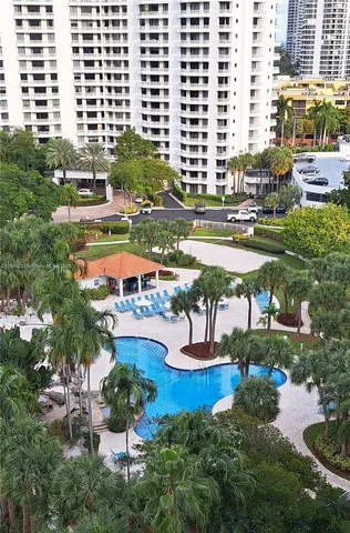 a view of swimming pool with a patio