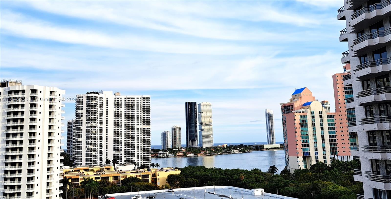 3300 Northeast 191st Street, Unit 1207 Aventura, FL 33180 - Photo 31 of 33 a city view with tall buildings