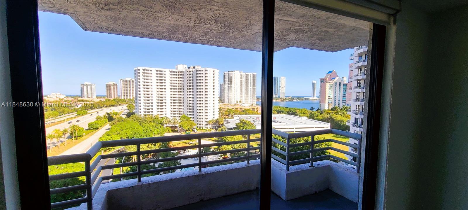 3300 Northeast 191st Street, Unit 1207 Aventura, FL 33180 - Photo 8 of 33 a view of a city from a balcony