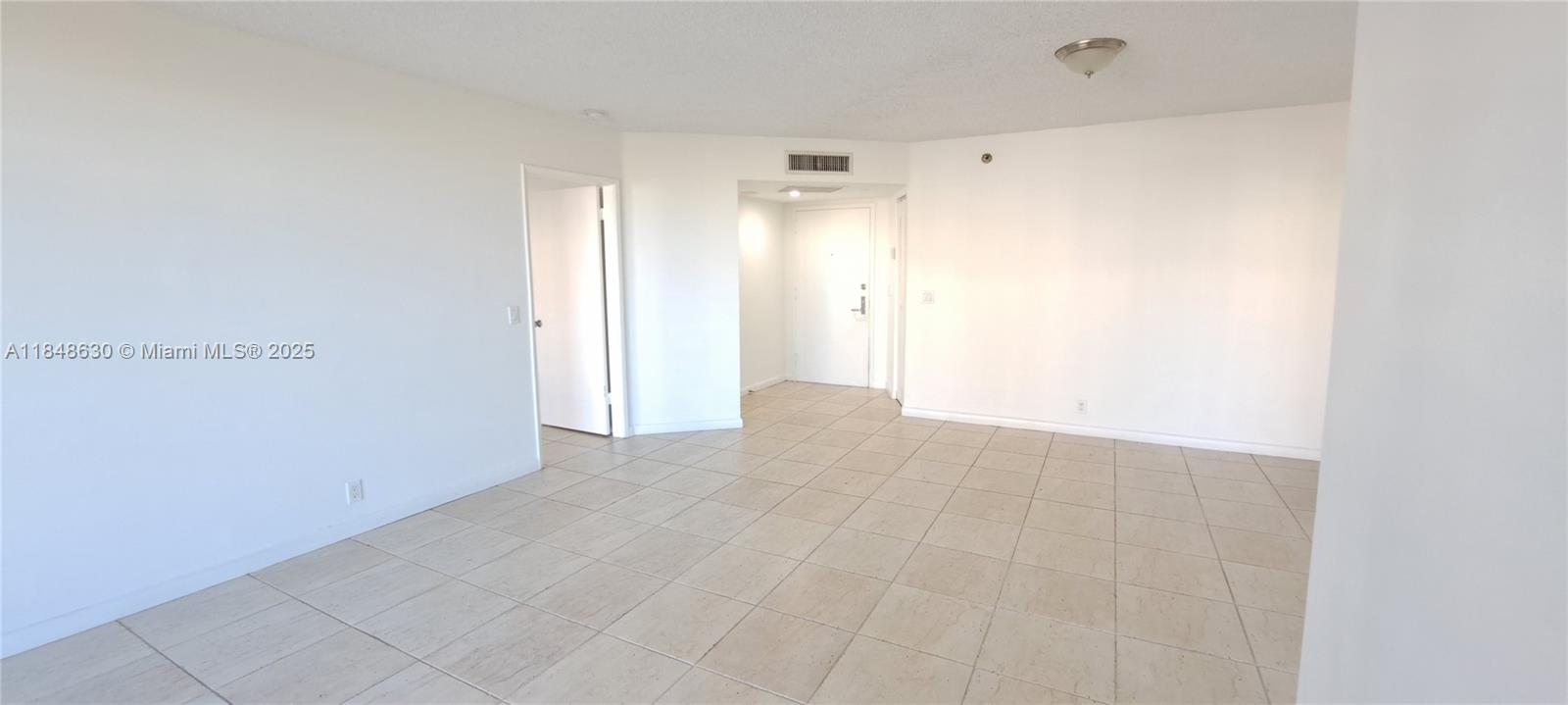 3300 Northeast 191st Street, Unit 1207 Aventura, FL 33180 - Photo 9 of 33 a view of an empty room