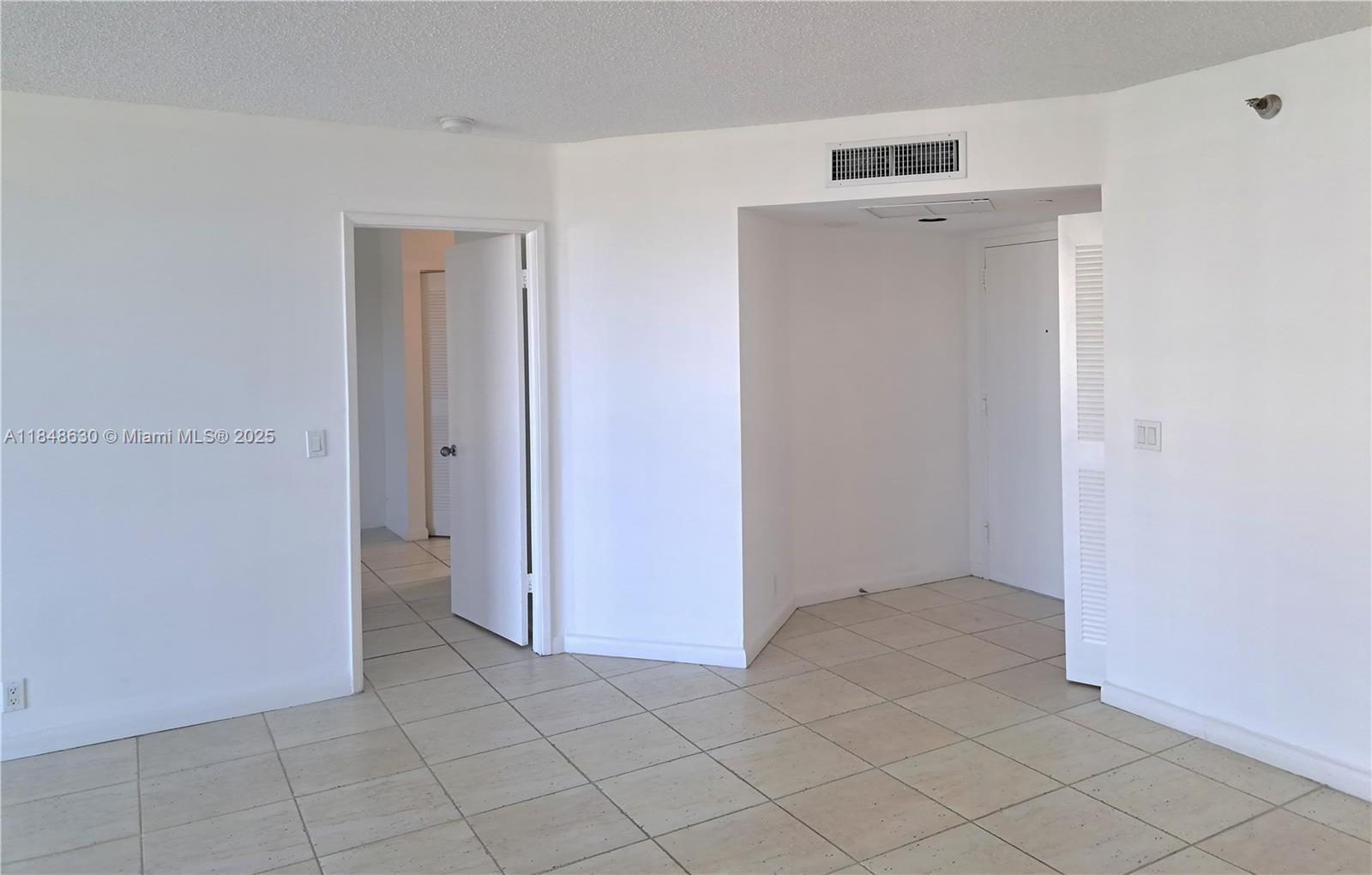 3300 Northeast 191st Street, Unit 1207 Aventura, FL 33180 - Photo 10 of 33 a view of an empty room