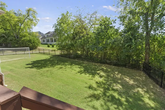 a kitchen with a table and chairs in it