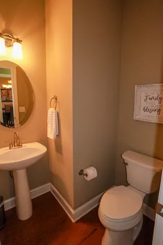 a outdoor view with sitting space and large trees