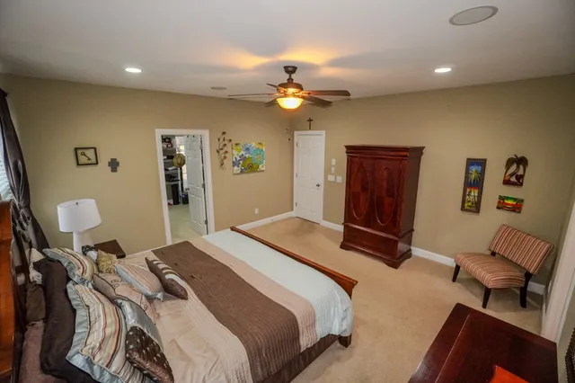 a view of a house with backyard and porch