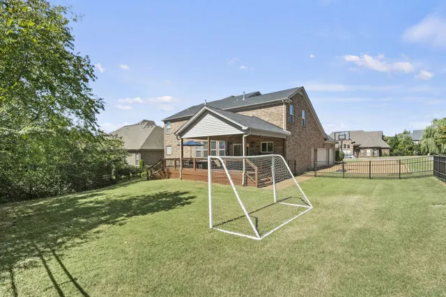a kitchen with a stove and a refrigerator