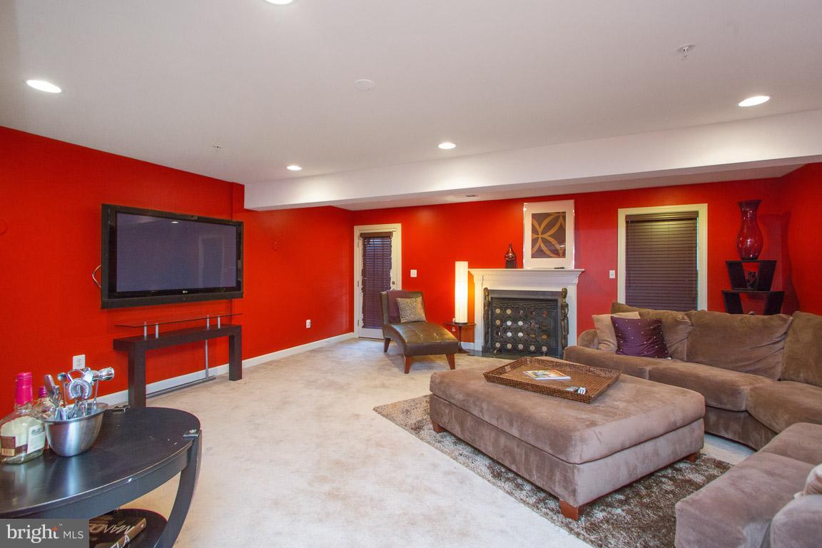 1557 Rutland Way Hanover, MD 21076 - Photo 26 of 37 Rear basement walk out and gas fireplace!