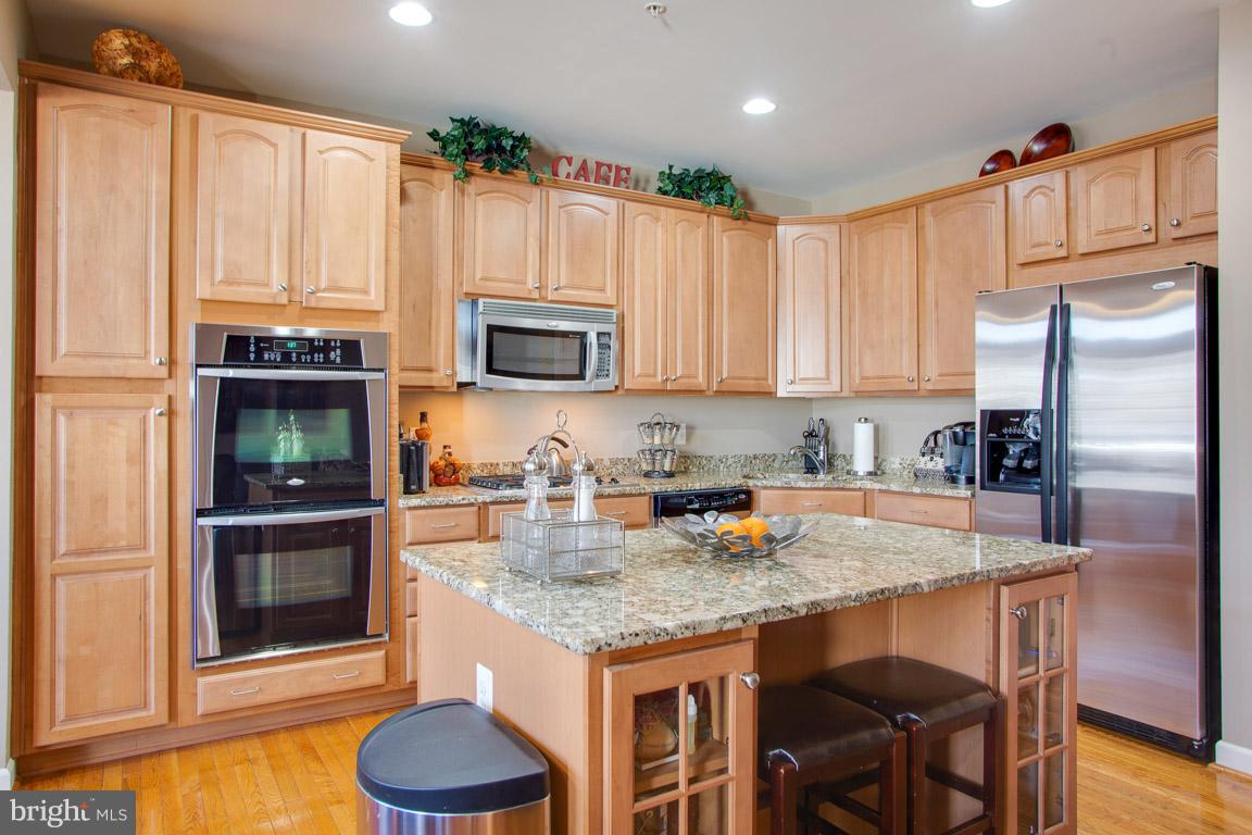 1557 Rutland Way Hanover, MD 21076 - Photo 8 of 37 Gas cooking, luxury appliances & island w/storage.