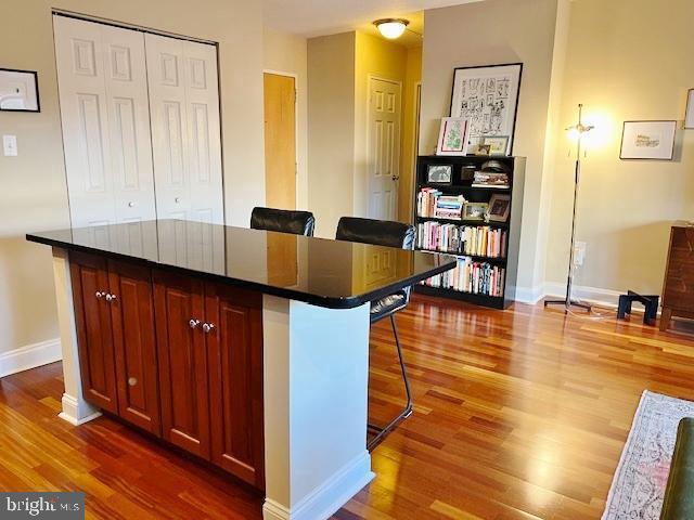 2101 Chestnut Street, Unit 517 Philadelphia, PA 19103 - Photo 5 of 15 a kitchen with stainless steel appliances granite countertop a granite counter tops and a view of living room