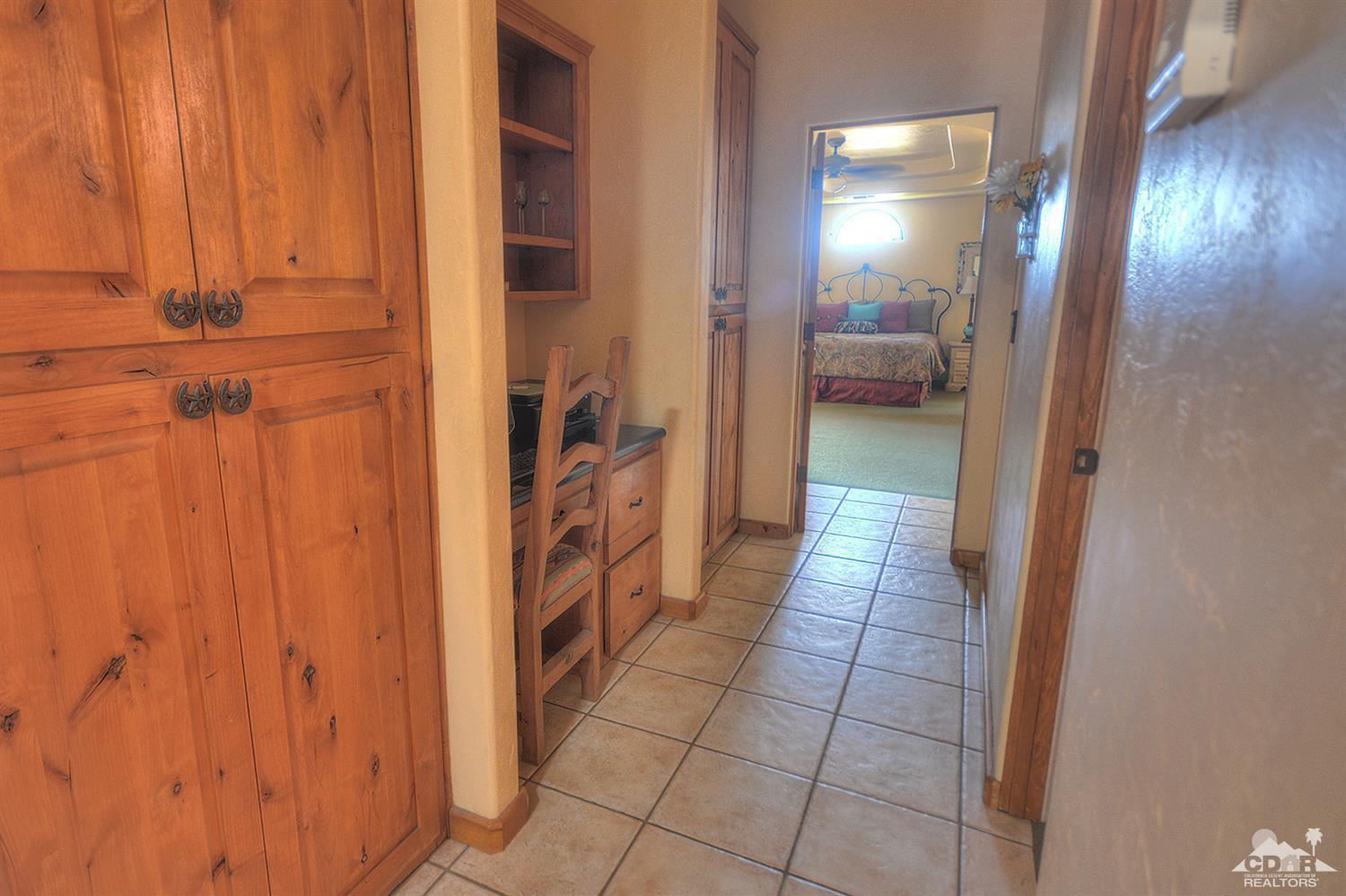 39825 Berenda Road Temecula, CA 92591 - Photo 24 of 54 a view of a hallway with a furniture