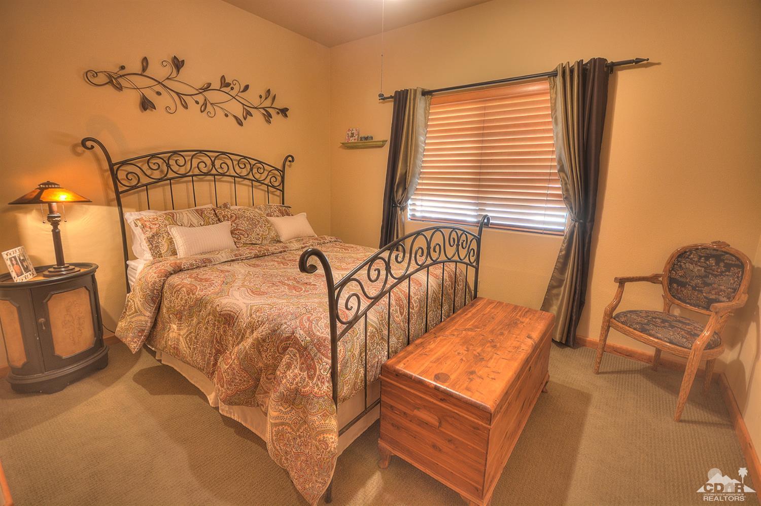 39825 Berenda Road Temecula, CA 92591 - Photo 25 of 54 a view of a bedroom with furniture