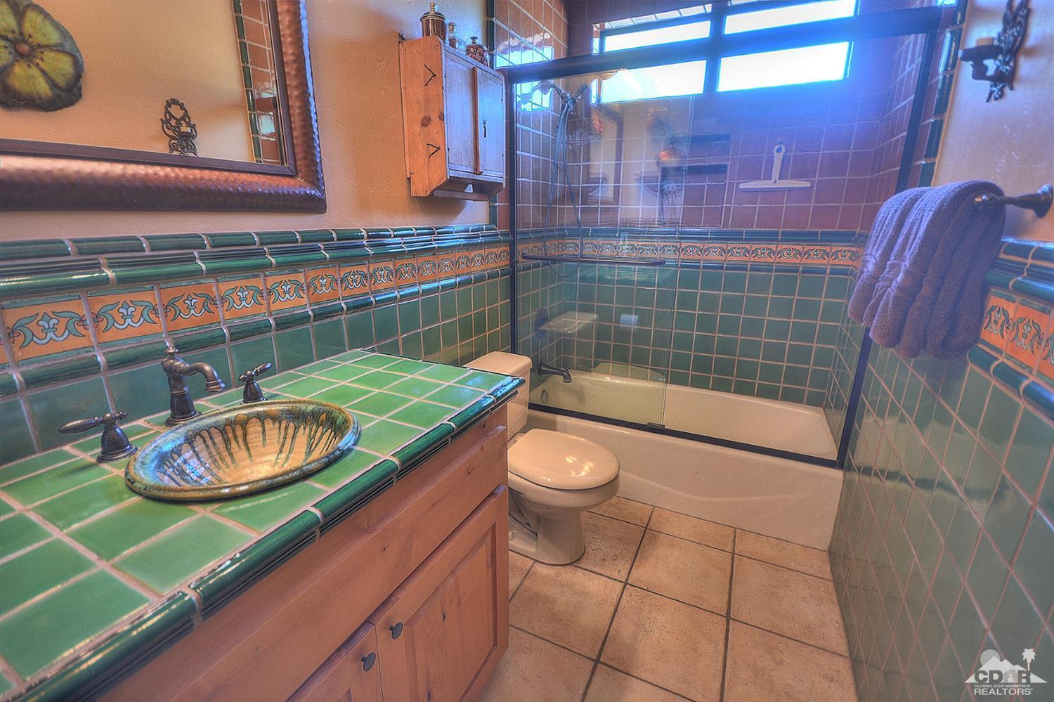 39825 Berenda Road Temecula, CA 92591 - Photo 27 of 54 a bathroom with a sink and a mirror