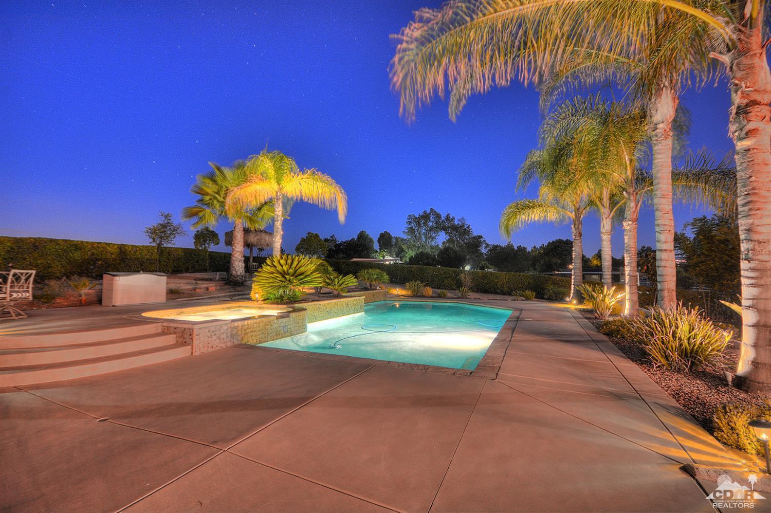39825 Berenda Road Temecula, CA 92591 - Photo 5 of 54 a view of a yard with swimming pool and sitting area