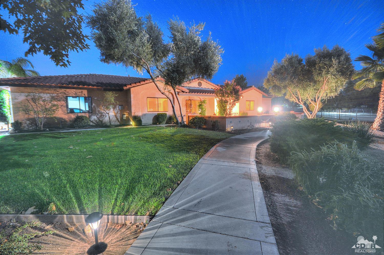 39825 Berenda Road Temecula, CA 92591 - Photo 7 of 54 a front view of a house with a yard