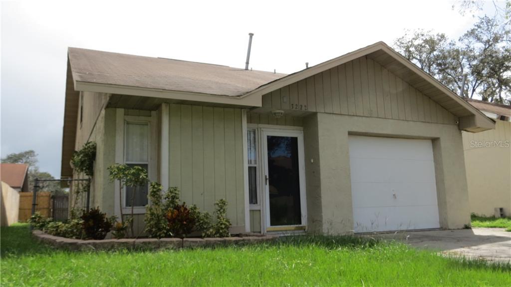 3222 Timberline Road Winter Haven, FL 33880 - Photo 1 of 1 a front view of house with yard