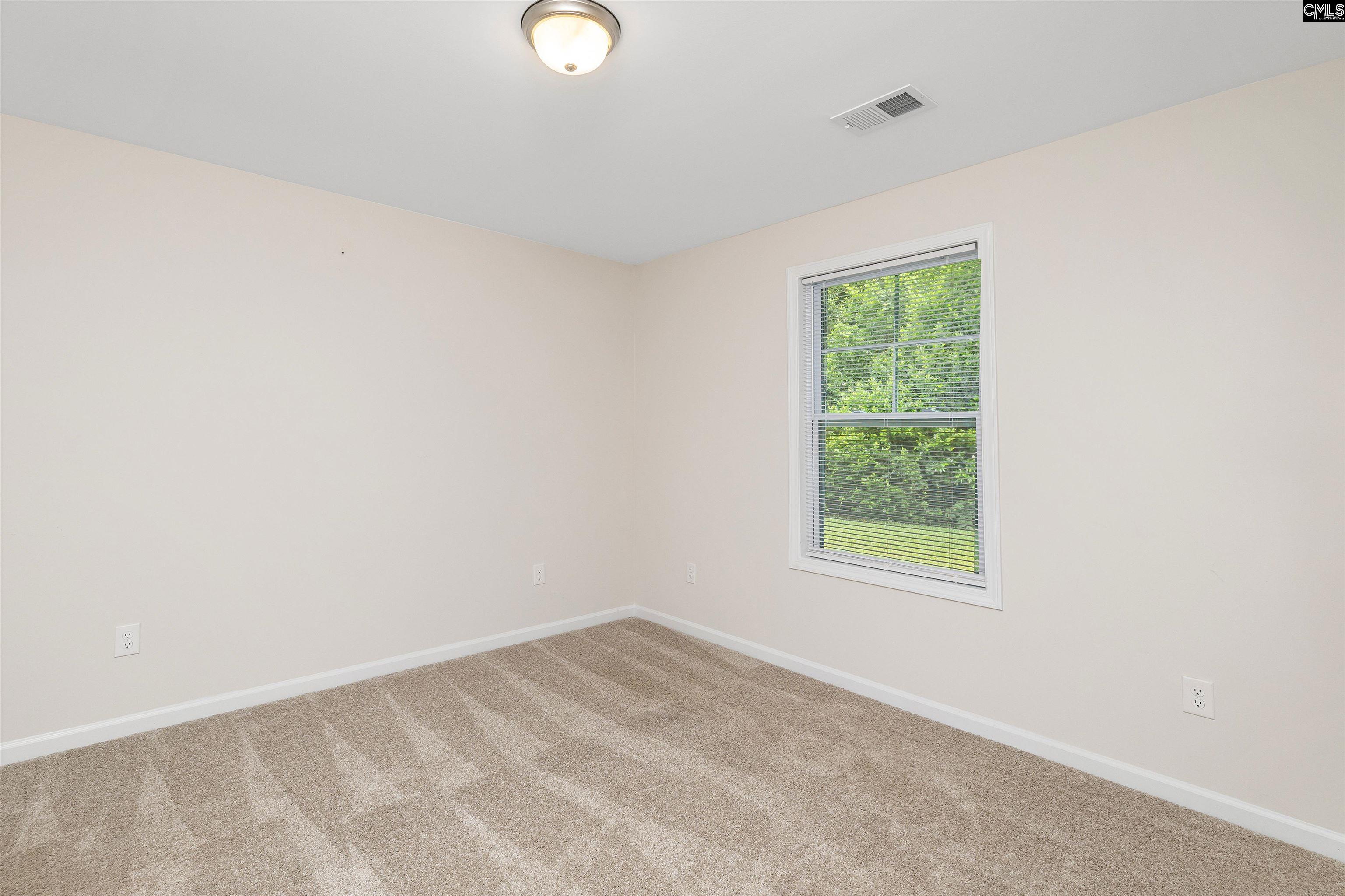 2157 Still Pointe Drive Sumter, SC 29154 - Photo 17 of 25 an empty room with a window